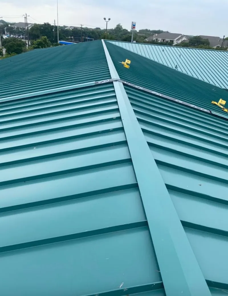 Green commercial metal roof ridge and valley for Metal Roof Repair in Colton