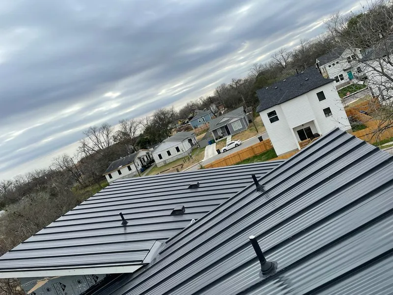 Standing seam metal roof panels with vents for Skylight Repair in Colton